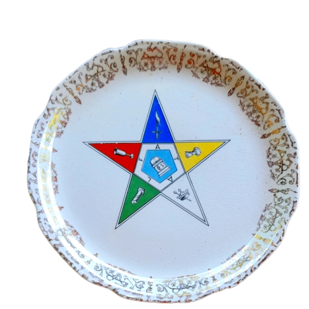 Vintage Eastern Star masonic plate with symbol surrounded by decorative gold bor